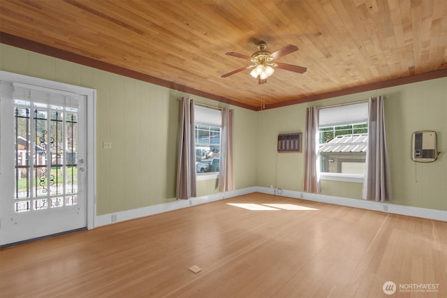 foyer with a wealth of natural light, wood ceiling, and wood finished floors