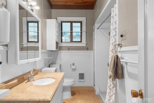 bathroom featuring visible vents, toilet, a shower with curtain, tile patterned flooring, and vanity