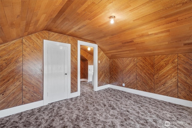 bonus room with carpet floors, wood walls, wood ceiling, and vaulted ceiling