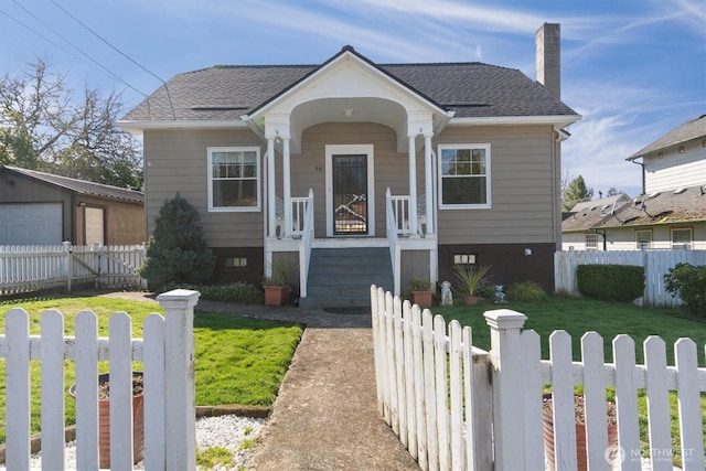 bungalow-style house featuring roof with shingles, a porch, crawl space, fence private yard, and a front lawn