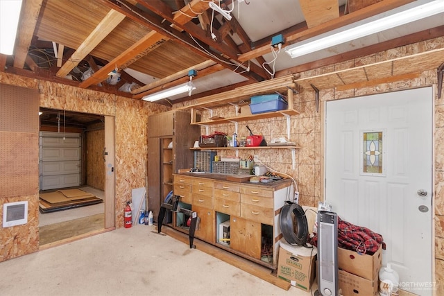 interior space with a garage and visible vents