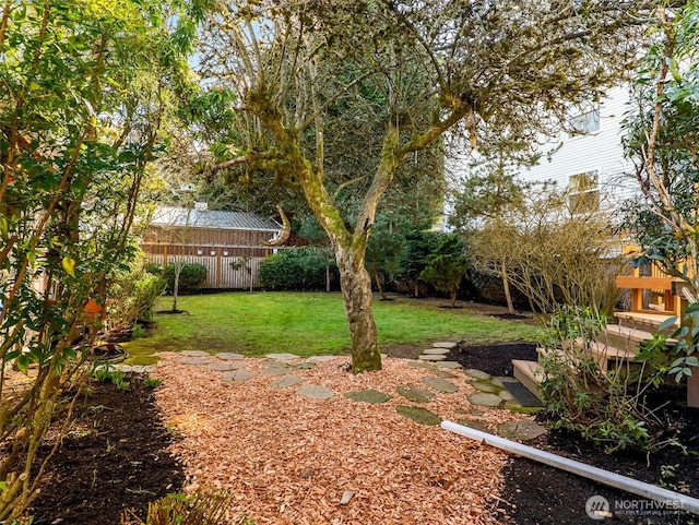 view of yard featuring fence