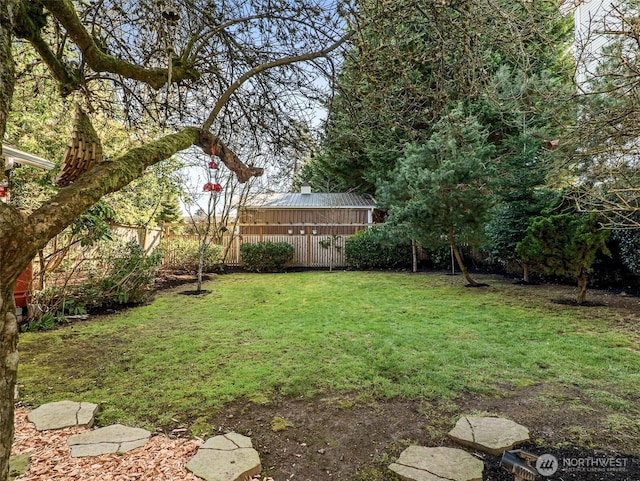 view of yard with fence