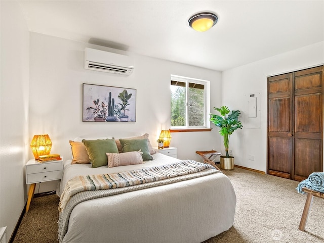 bedroom featuring baseboards, light carpet, and a wall mounted AC