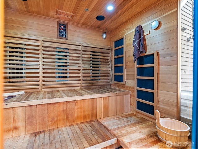 view of sauna / steam room featuring recessed lighting and wood-type flooring