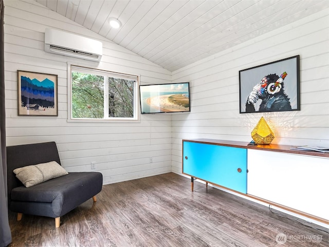 living area featuring lofted ceiling, wood ceiling, wood finished floors, and a wall mounted air conditioner