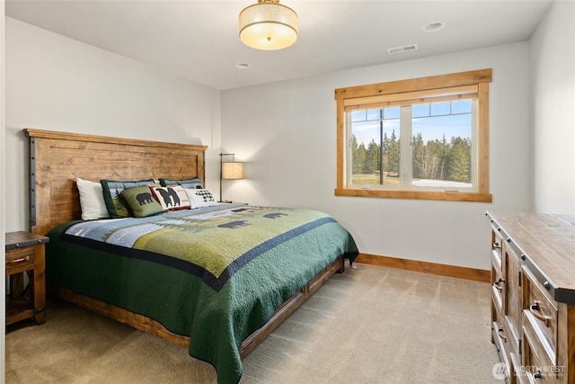 carpeted bedroom with recessed lighting, visible vents, and baseboards