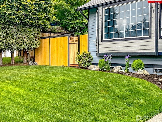 view of yard with fence