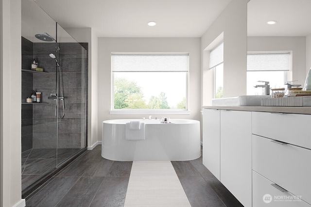 full bathroom featuring a soaking tub, vanity, recessed lighting, and a shower stall