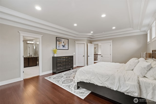 bedroom with crown molding, dark wood-type flooring, baseboards, a tray ceiling, and recessed lighting