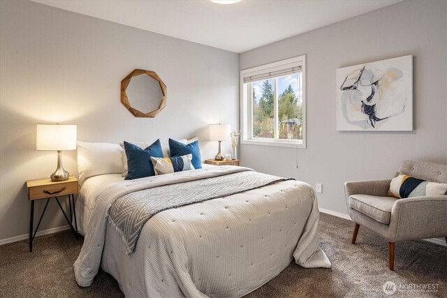 carpeted bedroom with baseboards