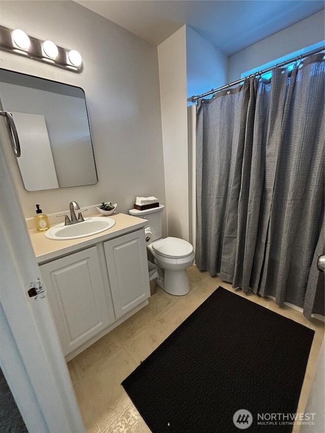 2168 Mcdonald Ave, Dupont, WA 98327 - bathroom with toilet, vanity, and a shower with curtain