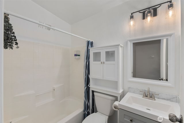 full bathroom with vanity, toilet, and shower / tub combo with curtain