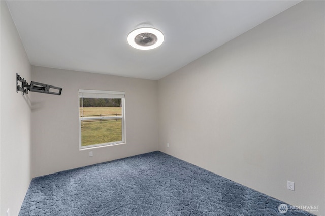 spare room featuring carpet flooring