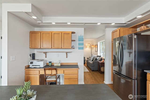 kitchen featuring recessed lighting, wood finished floors, freestanding refrigerator, and open shelves