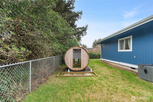 view of yard with cooling unit and a fenced backyard