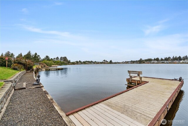 view of dock with a water view