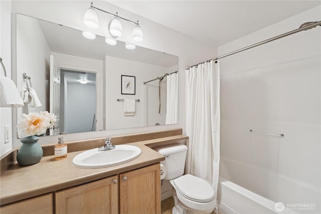 bathroom with vanity, toilet, and shower / bathtub combination with curtain