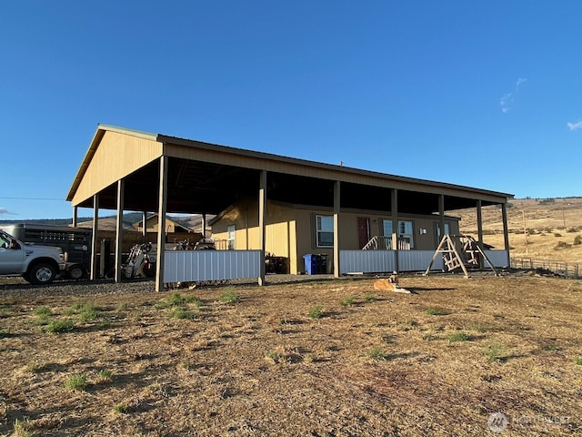 exterior space with a carport