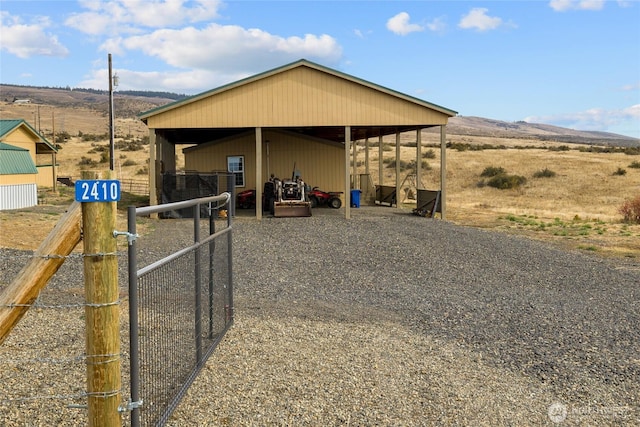 exterior space featuring a mountain view