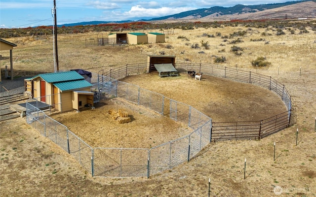 bird's eye view with a rural view and a mountain view