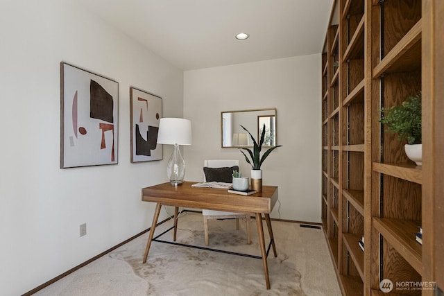 carpeted office with recessed lighting and baseboards