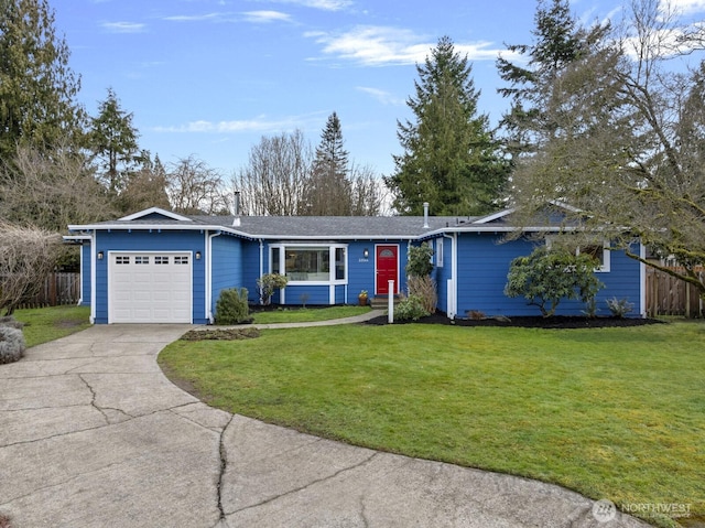 ranch-style home featuring a front lawn, concrete driveway, fence, and a garage