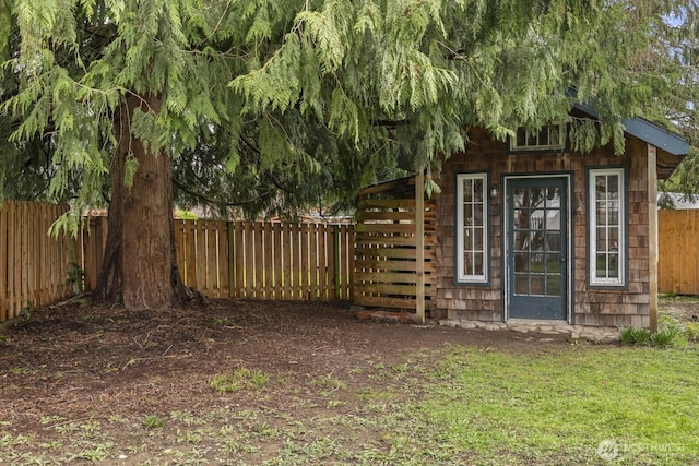 view of yard with a fenced backyard