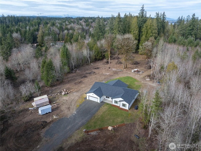 bird's eye view with a view of trees