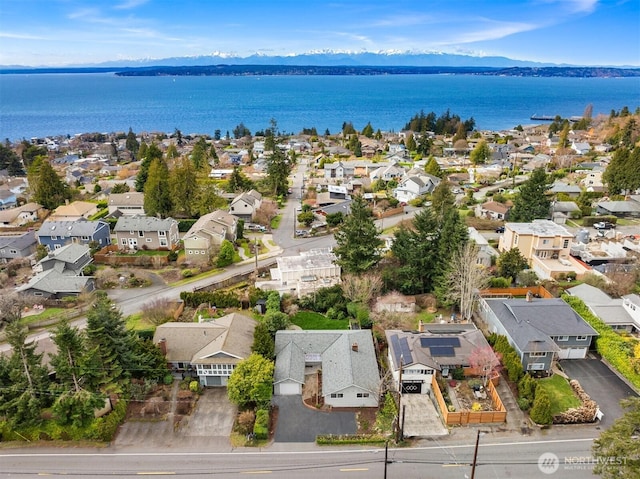 aerial view featuring a residential view and a water and mountain view