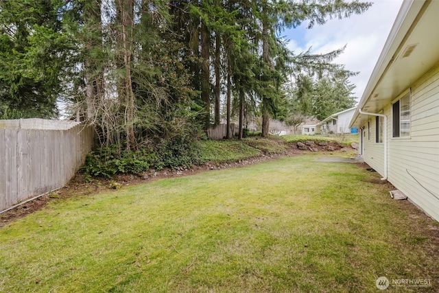 view of yard with fence