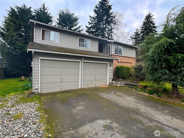 view of front of property with a garage