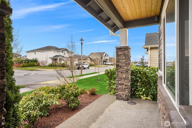 view of patio with a residential view