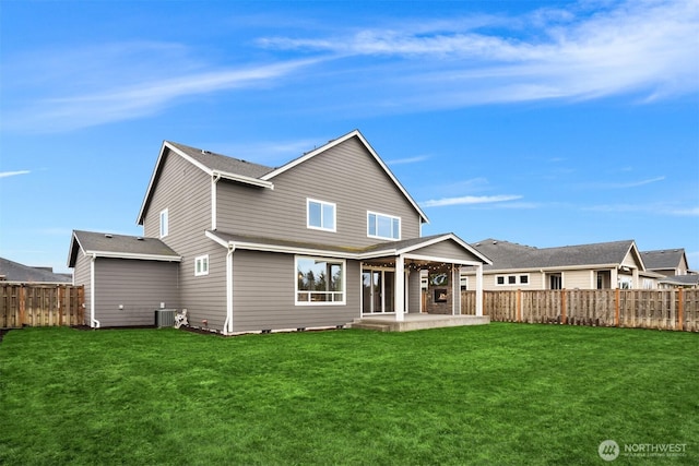 back of property with a patio area, cooling unit, a lawn, and a fenced backyard