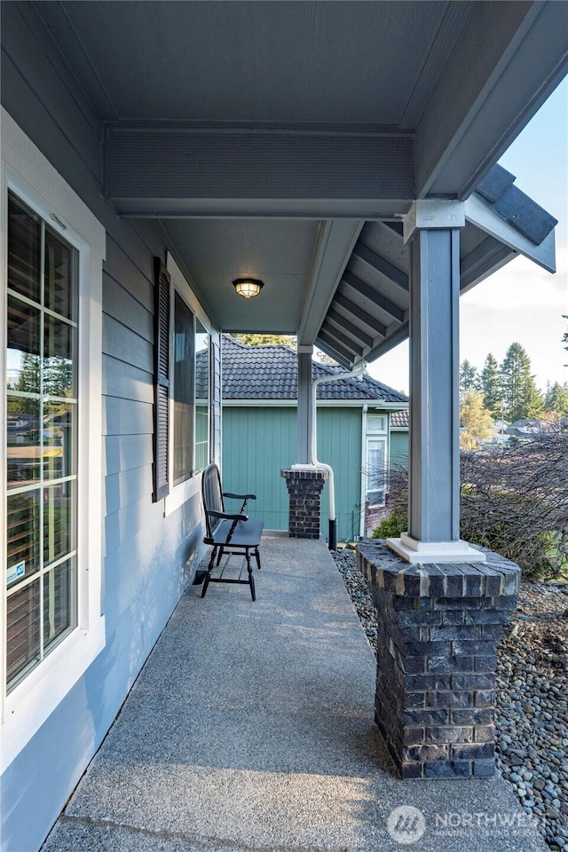 view of patio featuring a porch