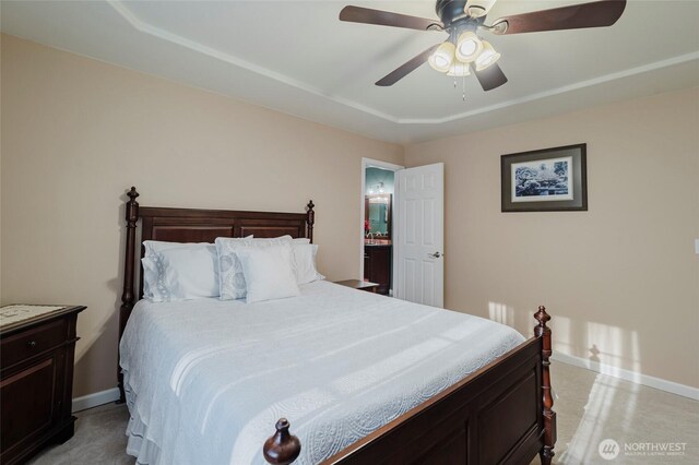 bedroom with ceiling fan and baseboards