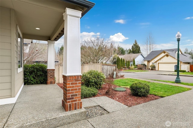 view of patio with a residential view and covered porch