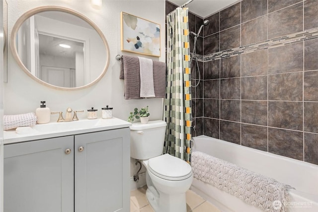 bathroom with vanity, toilet, and shower / tub combo with curtain