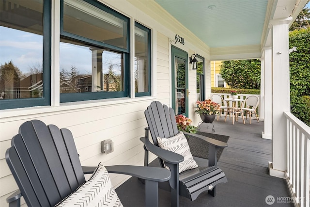 view of patio featuring a porch