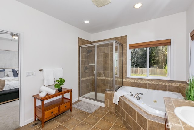 ensuite bathroom with recessed lighting, connected bathroom, a shower stall, tile patterned flooring, and a whirlpool tub