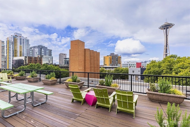 wooden terrace with a view of city