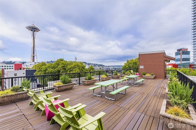 wooden terrace with a view of city