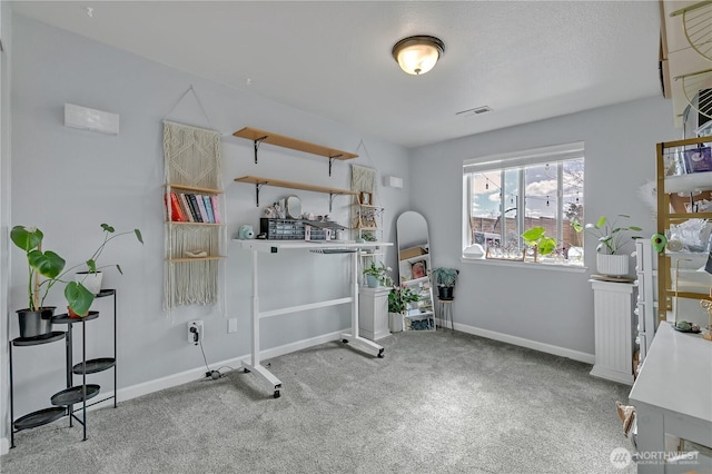 miscellaneous room with visible vents, baseboards, and carpet