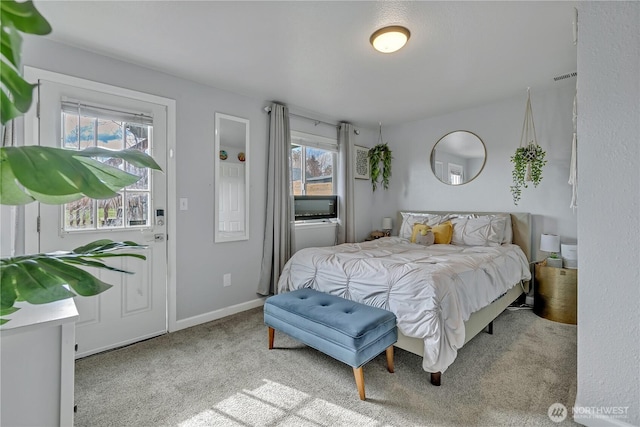 bedroom featuring visible vents, baseboards, and carpet floors