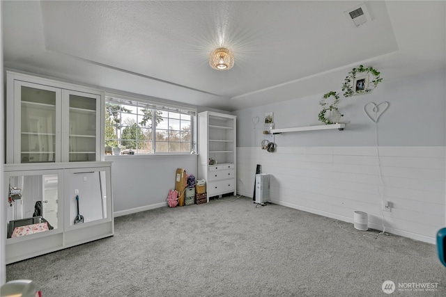 game room featuring visible vents, wainscoting, and carpet floors