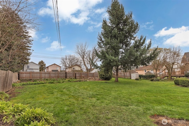 view of yard with fence