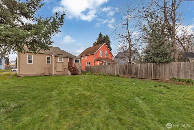 view of yard with fence