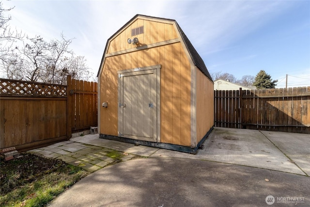 view of shed featuring a fenced backyard