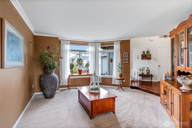 living room with light colored carpet, baseboards, and ornamental molding