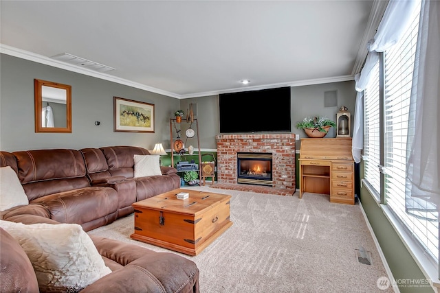 living room with carpet floors, a fireplace, visible vents, and ornamental molding